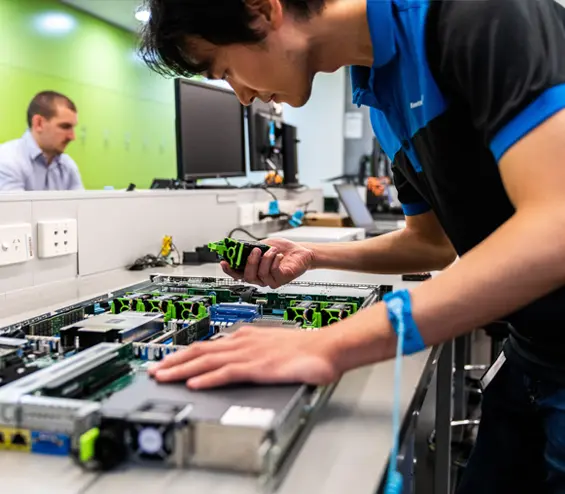 a person doing hardware maintenance work