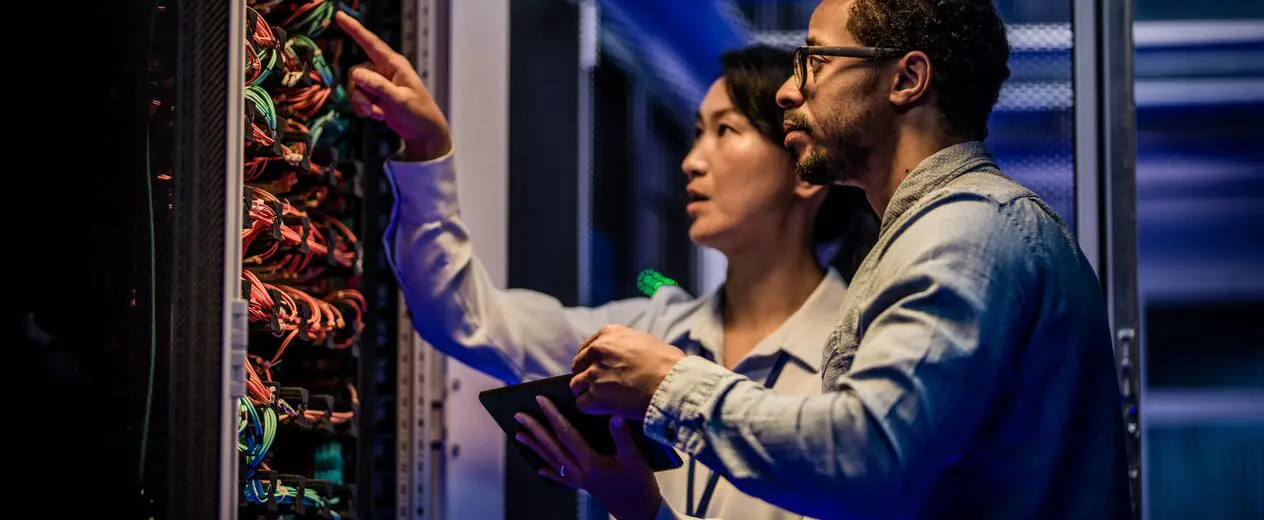 two person working at data centre